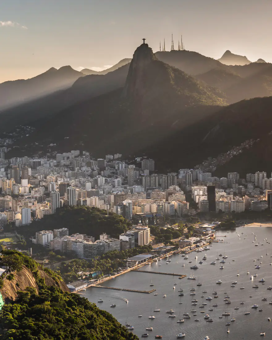 Rio de Janeiro's bay and mountains at sunset, with Corcovado on the skyline