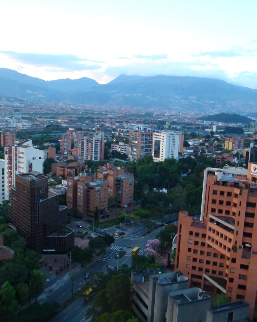 Medellín's skyline in the Aburrá Valley with mountains behind