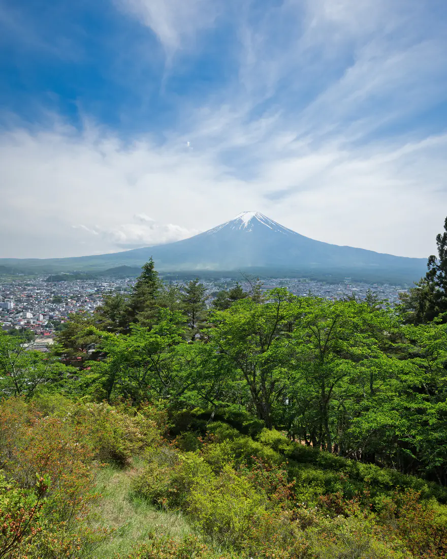 Mount Fuji seen across Fujiyoshida from Arakurayama Sengen Park