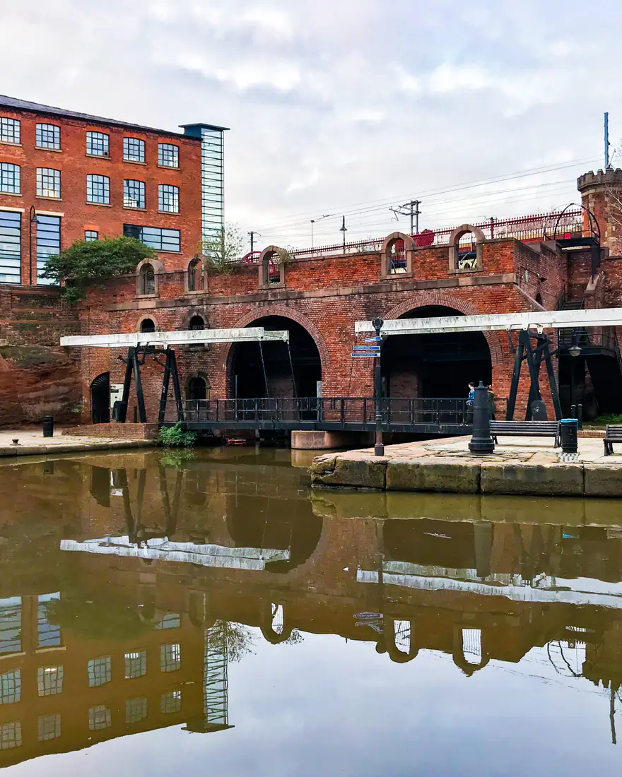 A canal basin and red-brick warehouse at Castlefield, Manchester