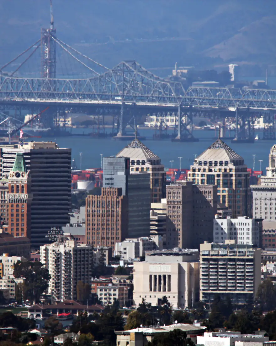 Downtown Oakland with the Bay Bridge behind