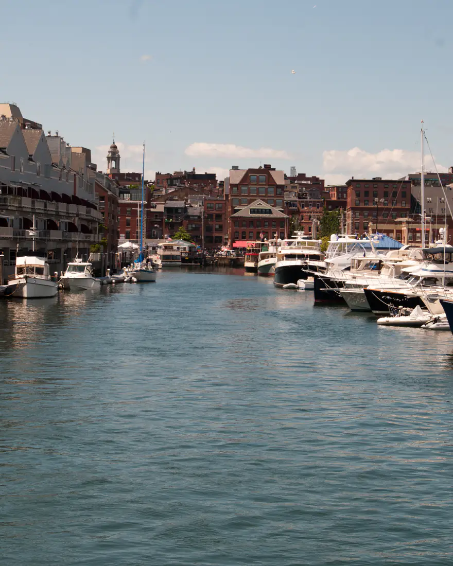 Boats moored along a harbor slip in Portland's Old Port