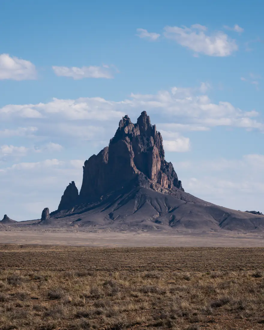 Shiprock rising above the high desert plain