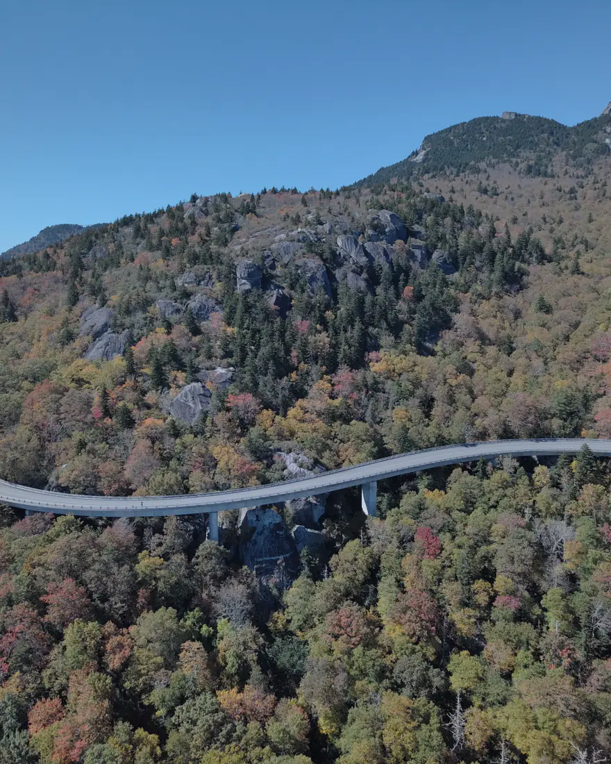 The Linn Cove Viaduct curving through autumn forest on the Blue Ridge Parkway