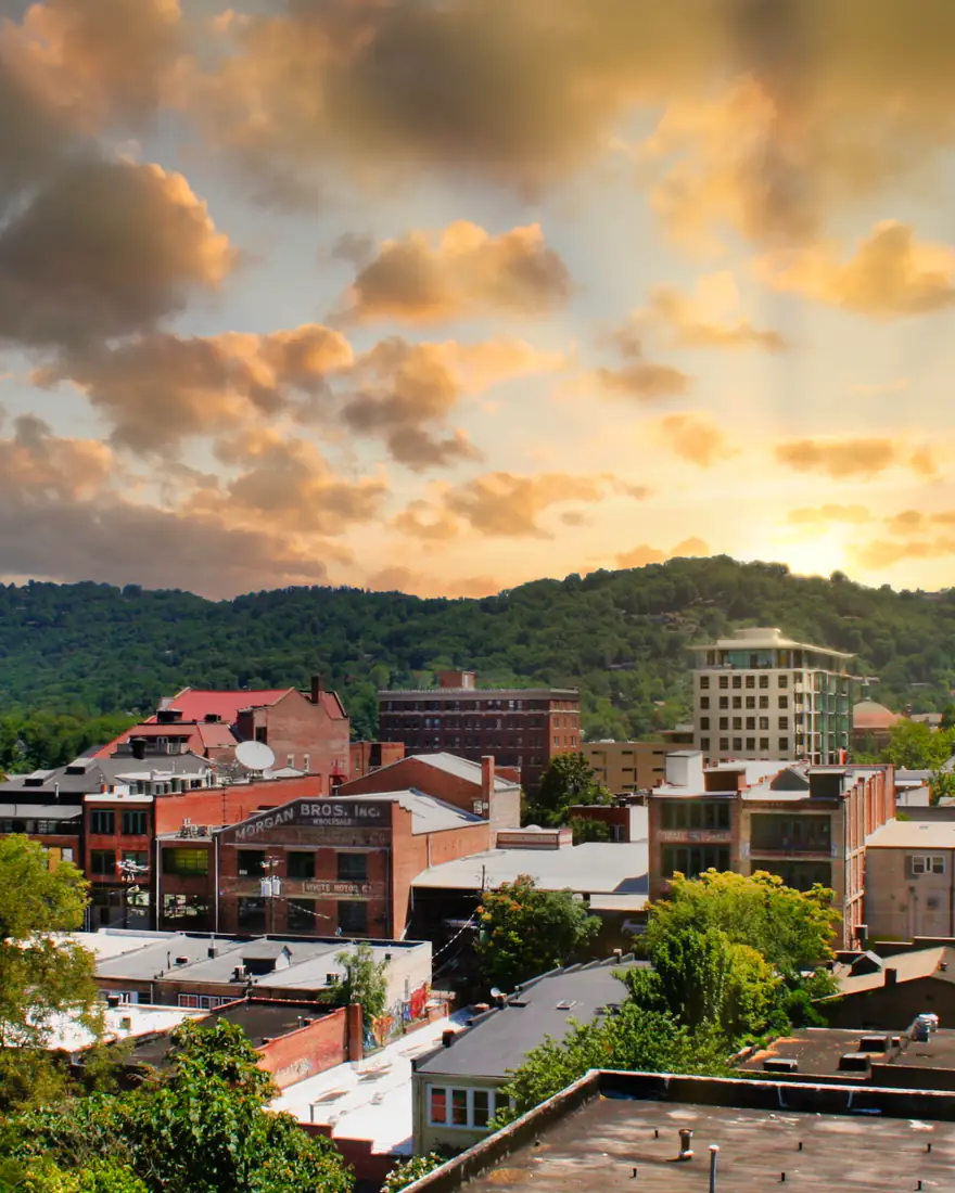 Downtown Asheville and the Blue Ridge at sunset
