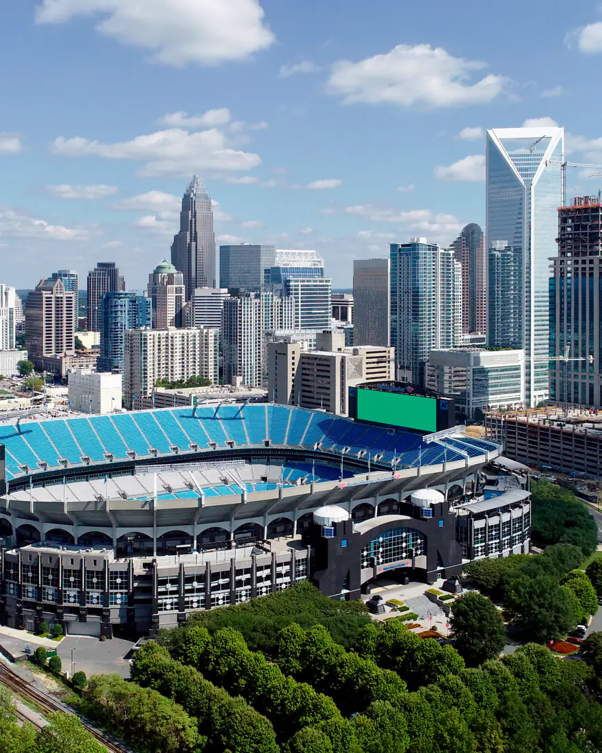 Aerial view of Uptown Charlotte and its football stadium