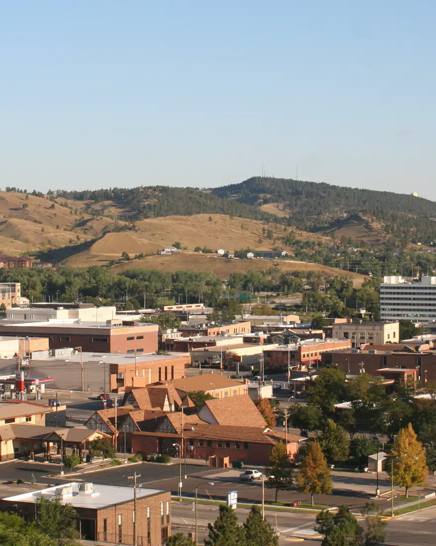 Rapid City's downtown below the Black Hills foothills