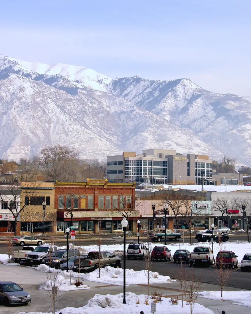 Downtown Ogden beneath the snow-covered Wasatch Mountains