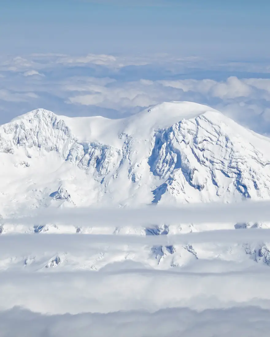 Mount Rainier rising above the clouds
