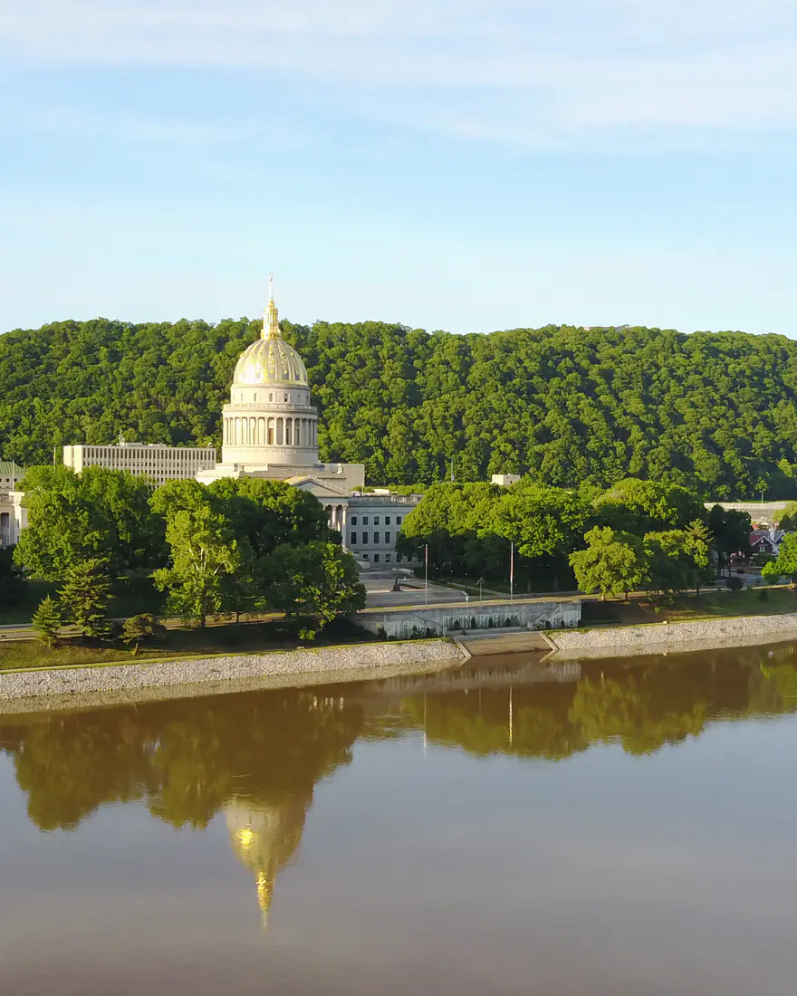 The West Virginia State Capitol reflected in the Kanawha River, Charleston