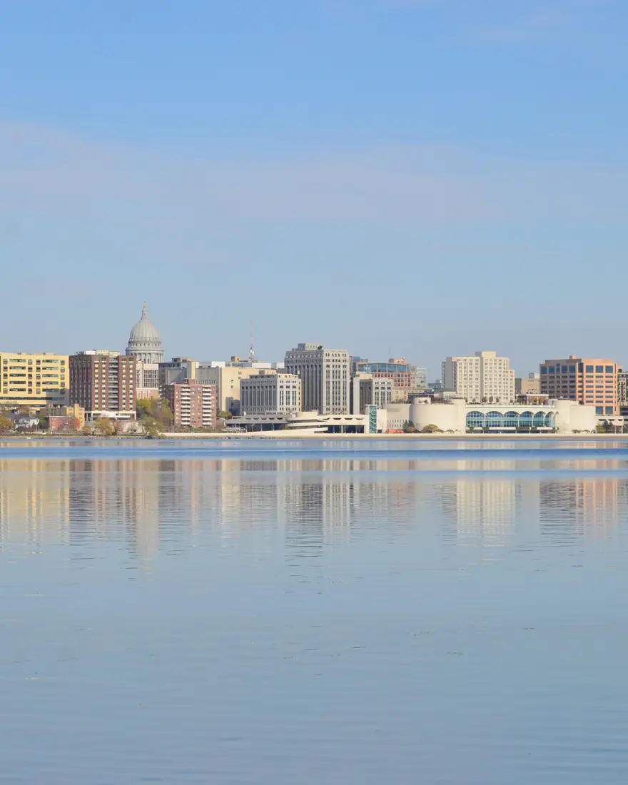 Madison's skyline and the Wisconsin State Capitol across Lake Monona